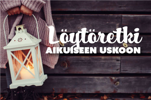 Nainen valaiseva lyhty kädessään.